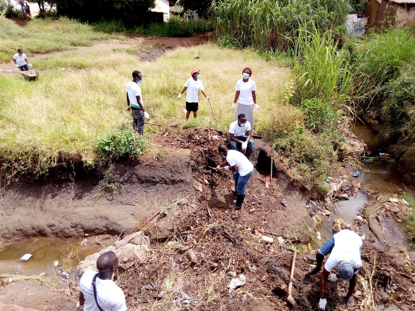 YED members cleaning up a dumpsite in March 2019